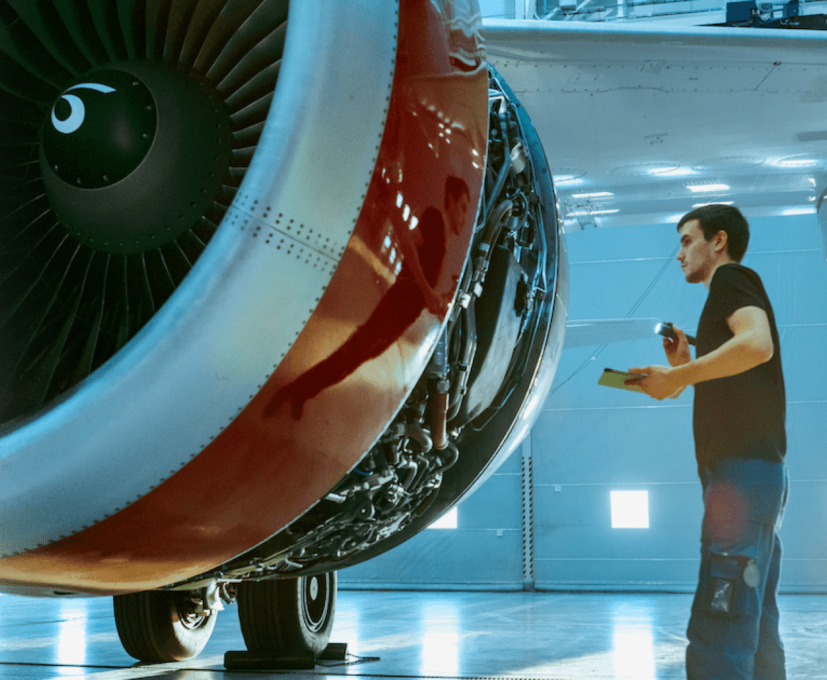 man working on a plane man working on a plane